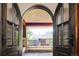Private balcony with wrought iron railings offering views of surrounding landscape at 2435 S Milwaukee St, Denver, CO 80210