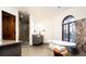 Spa-like bathroom with a soaking tub and walk-in shower at 2435 S Milwaukee St, Denver, CO 80210