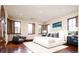 Bright bedroom with a king-size bed and hardwood floors at 2435 S Milwaukee St, Denver, CO 80210