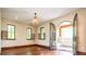 Charming bedroom with hardwood floors and private balcony access at 2435 S Milwaukee St, Denver, CO 80210