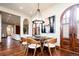 Charming dining area with a round table and modern chairs at 2435 S Milwaukee St, Denver, CO 80210