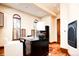 Functional home office with built-in desk and hardwood floors at 2435 S Milwaukee St, Denver, CO 80210