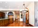 Elegant kitchen with chandelier and hardwood floors at 2435 S Milwaukee St, Denver, CO 80210