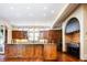 Spacious kitchen with island, stainless steel appliances, and hardwood floors at 2435 S Milwaukee St, Denver, CO 80210
