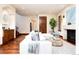 Light-filled living area featuring hardwood floors and comfortable seating at 2435 S Milwaukee St, Denver, CO 80210