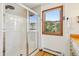 Bathroom with a large walk-in shower and window at 9722 Lost Dove Trl, Golden, CO 80403