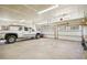 Large garage with space for two vehicles and storage at 9722 Lost Dove Trl, Golden, CO 80403