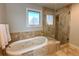 Spa-like bathroom with soaking tub and walk-in shower at 6284 S Lima Way, Englewood, CO 80111