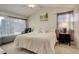 Large main bedroom with vaulted ceiling and window at 10589 Winterflower Way, Parker, CO 80134