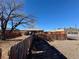 Backyard with a wooden fence and gravel at 3690 Leyden St, Denver, CO 80207