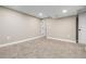 Finished basement bedroom with carpet and an adjacent closet at 12953 E Cornell Ave, Aurora, CO 80014