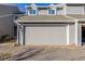 Attached garage with ample space for parking and storage at 12953 E Cornell Ave, Aurora, CO 80014