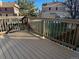 Wooden back deck with railing at 12008 E Tennessee Dr, Aurora, CO 80012