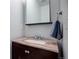 Simple bathroom with single vanity and brown marbled countertop at 12008 E Tennessee Dr, Aurora, CO 80012