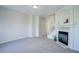 Living room with fireplace, stairs, and carpet at 12008 E Tennessee Dr, Aurora, CO 80012