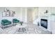 Living room with fireplace and comfortable seating area at 12008 E Tennessee Dr, Aurora, CO 80012
