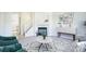 Living room featuring a fireplace, and a cozy sitting area at 12008 E Tennessee Dr, Aurora, CO 80012