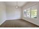 Bright dining room with hardwood floors and large windows at 920 Sunny Way, Lafayette, CO 80026