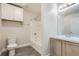 Clean bathroom with a bathtub, vanity, and overhead lighting at 1758 Eagle St # C, Aurora, CO 80011