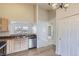 Modern kitchen with stainless steel appliances and light wood cabinets at 1758 Eagle St # C, Aurora, CO 80011