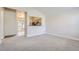 Open living area with a view into the kitchen at 1758 Eagle St # C, Aurora, CO 80011