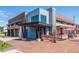 Modern commercial building with outdoor seating at 6747 Raritan Dr, Denver, CO 80221