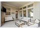 Covered patio with seating area, great for outdoor relaxation at 6747 Raritan Dr, Denver, CO 80221