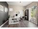 Modern home office with built-in shelving and a large desk at 6747 Raritan Dr, Denver, CO 80221