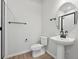 Clean bathroom with pedestal sink and shower at 461 Interlocken Blvd # 103, Broomfield, CO 80021