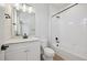 Modern bathroom with white vanity, tub, and black fixtures at 461 Interlocken Blvd # 103, Broomfield, CO 80021