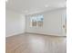Spacious living room featuring light-toned floors and recessed lighting at 461 Interlocken Blvd # 103, Broomfield, CO 80021
