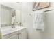 Clean bathroom with white vanity and a white towel at 1100 S Waco St # G, Aurora, CO 80017