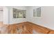 Spacious dining area with hardwood floors and large bay window at 4381 Cheyenne Dr, Larkspur, CO 80118