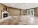 Finished basement with fireplace and access to backyard at 4381 Cheyenne Dr, Larkspur, CO 80118
