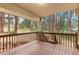 Deck overlooking a wooded area, offering peaceful outdoor space at 4381 Cheyenne Dr, Larkspur, CO 80118