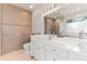 Elegant bathroom with dual sinks and a spacious vanity at 4381 Cheyenne Dr, Larkspur, CO 80118