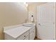 Small bathroom with vanity and white countertop at 4381 Cheyenne Dr, Larkspur, CO 80118