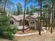 House exterior with stone walkway and landscaping at 4381 Cheyenne Dr, Larkspur, CO 80118