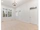Bright bedroom with carpet, large windows, and plenty of natural light at 4381 Cheyenne Dr, Larkspur, CO 80118