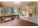 Spacious deck with wooded views and a bay window at 4381 Cheyenne Dr, Larkspur, CO 80118