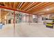 Unfinished basement with high ceilings and plenty of storage space at 4381 Cheyenne Dr, Larkspur, CO 80118