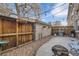 Private patio with fire pit and grill at 2460 W Caithness Pl # 104, Denver, CO 80211