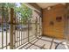 Secure building entrance with gated access and intercom at 837 E 17Th Ave # 2K, Denver, CO 80218