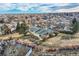 Wide lot with a mid-century home and distant city views at 34 S Raleigh St, Denver, CO 80219