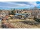 House with backyard, offering a view of the Denver skyline at 34 S Raleigh St, Denver, CO 80219