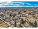 House and surrounding neighborhood aerial view at 34 S Raleigh St, Denver, CO 80219