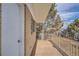 Private deck with wood flooring and wrought iron railing at 34 S Raleigh St, Denver, CO 80219