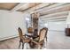 Elegant dining area featuring hardwood floors and a charming chandelier at 34 S Raleigh St, Denver, CO 80219
