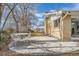 Round patio table with chairs near house at 34 S Raleigh St, Denver, CO 80219