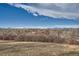Stunning mountain views from the backyard of the property at 34 S Raleigh St, Denver, CO 80219